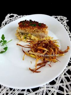 Una foto de Merluza al horno con costra de avellanas