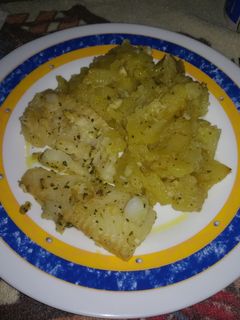 Una foto de Patatas de ajo perejil