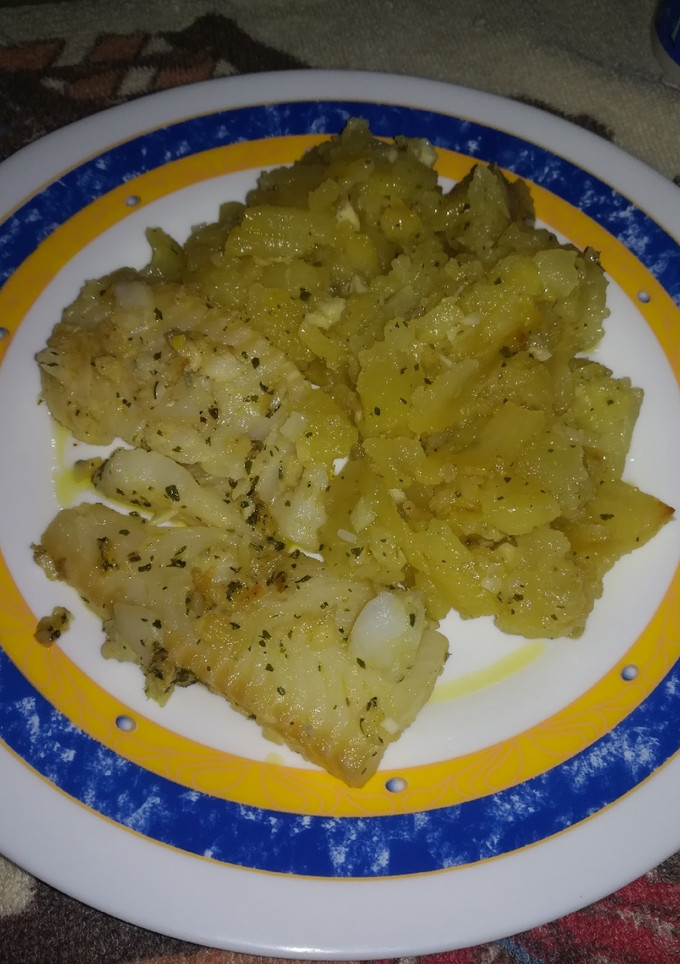 Una foto de Patatas de ajo perejil