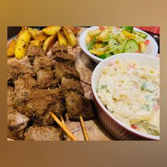 A picture of Grilled Beef Skewers with Macaroni and Salad!.
