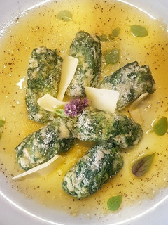 Una foto de Gnudi de espinaca