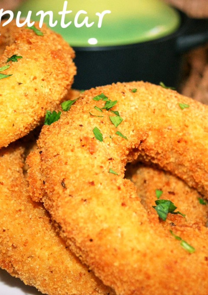 Una foto de Aros de cebolla rellenos de queso 🧀 🧀