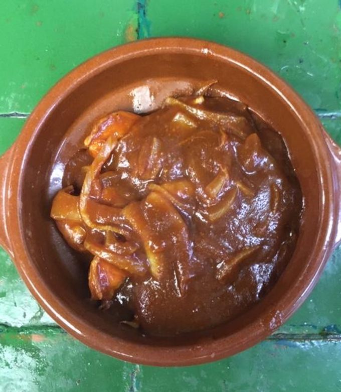 Una foto de Camarones en adobo