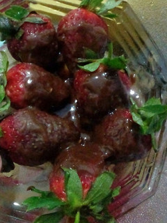 A picture of Cadbury chocolate dipped strawberries.