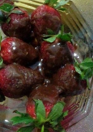 A picture of Cadbury chocolate  dipped strawberries.