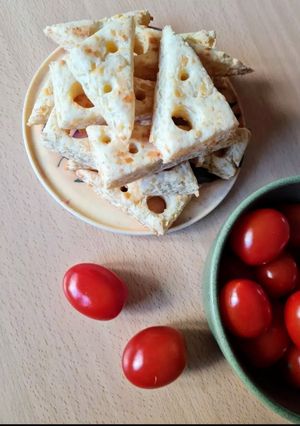 Una foto de Scones de queso 🧀 con formita de quesito