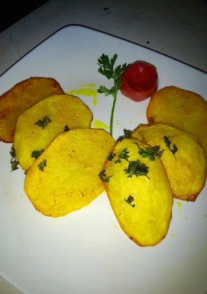 A picture of Tumeric potato slices #AuthorMarathon.