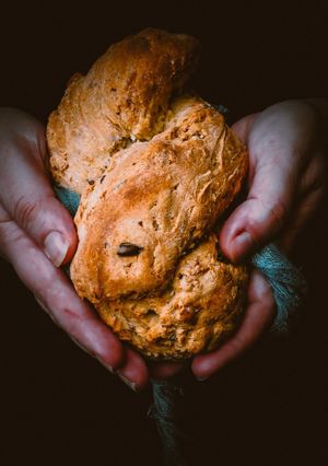 Foto di Treccia di pane ai cereali, croccante e morbida