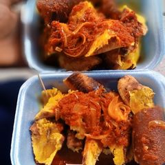 A picture of Roasted Plantain (Boli) + Pomo Sauce.