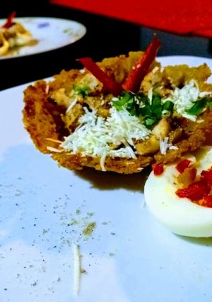 Una foto de Canastilla de plátano con pollo