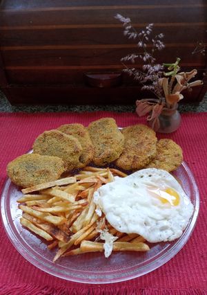 Una foto de Milanesas de boniato a caballo