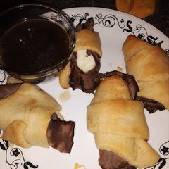 A picture of French Dip Roll-Ups.