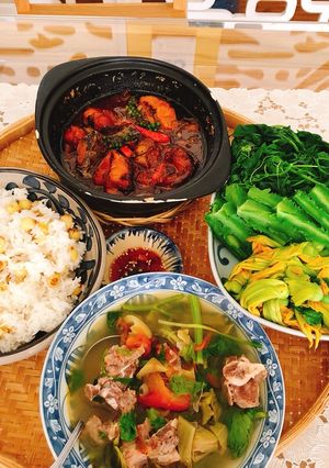 A picture of Lotus Rice with Mixed Greens and Braised Catfish.