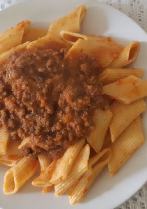 Una foto de Macarrones con salsa