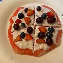 A picture of Watermelon pizza/ fruit pizza.