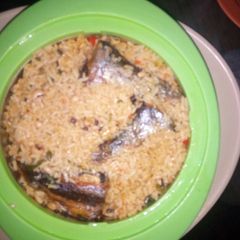 A picture of Jollof rice and beans.