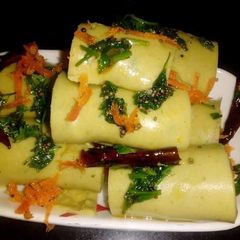 A picture of Spinach Khandvi.