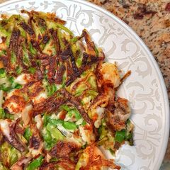 A picture of Pajeon (spring onion pancakes).