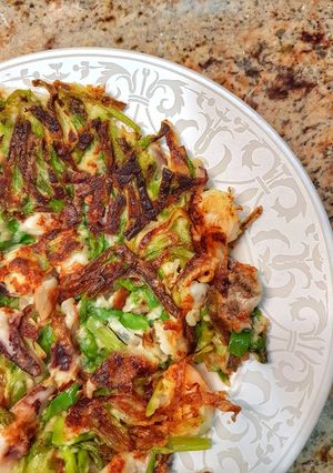 A picture of Pajeon (spring onion pancakes).