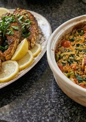 صورة لوصفة طاجن الرز والخضار مع السمك المقلي