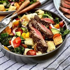 A picture of Grilled Wagyu Steak Panzanella Salad with Vinaigrette.