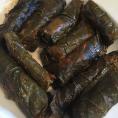 A picture of Yaprak Sarma (stuffed grape leaves).