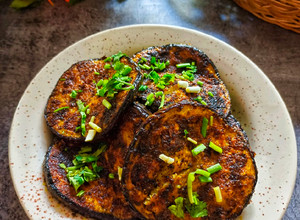 A picture of Begun Bhaja / Paleta / Eggplant fry.