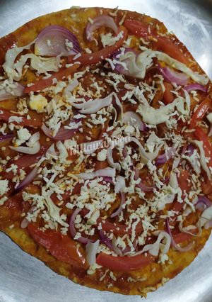 A picture of Pizza with leftover Chapati dough.