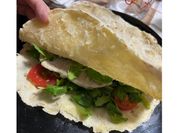Una foto di lonza di maiale al pomodoro