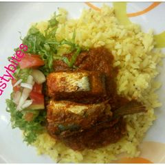 A picture of Rice and fish stew.