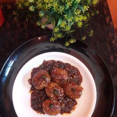 A picture of Honey garlic chilli baby potatoes in cornflour gravy.