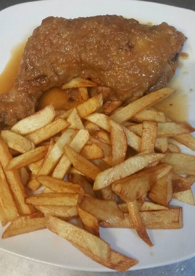 Una foto de Pollo encebollado en salsa agridulce