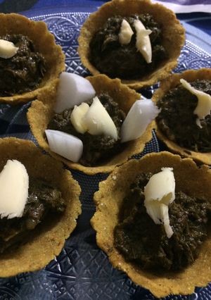 A picture of Sarson ka saag in corn canapes.