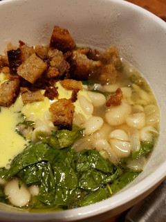 A picture of Rich Butter Beans with Greens, Toasted Bread, and Aioli.