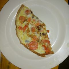 A picture of Fried eggs carrots.