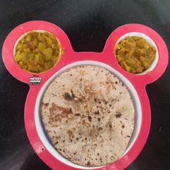A picture of Chappan kadu with whole wheat roti.