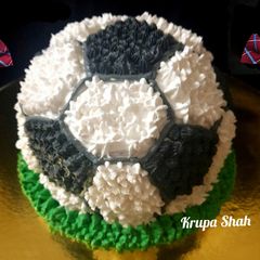 White Forest Football cake A picture of White Forest Football cake.