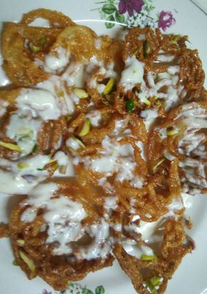 A picture of Paneer Rajgira Jalebi with Sitaphal Rabdi.