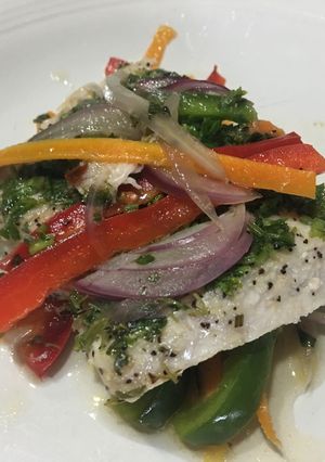 Una foto de Pescado en papel (Pesce al cartoccio)