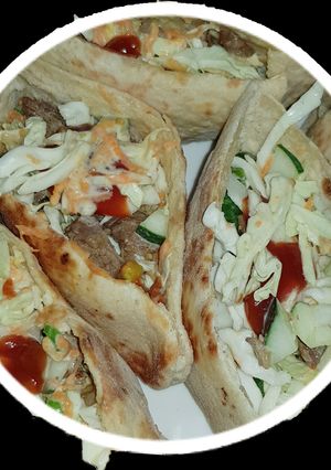 A picture of Beef stuffed pita pocket.