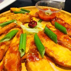A picture of Chilli Potato Wedges.