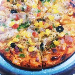 A picture of Extra MoreCheese Veggie Pizza.