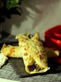 Una foto de Tupper Saludable: Crepes Gratinados de Ricota y Hortalizas