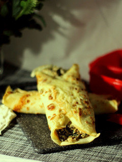 Una foto de Tupper Saludable: Crepes Gratinados de Ricota y Hortalizas