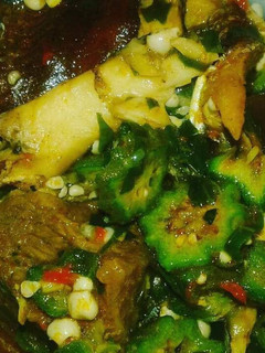 A picture of Fresh okro and goat meat.