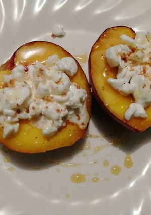 Una foto de Duraznos con queso cottage