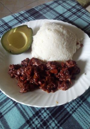 A picture of Pork and ugali.