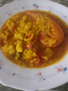 Una foto de Arroz caldoso de pescado y marisco