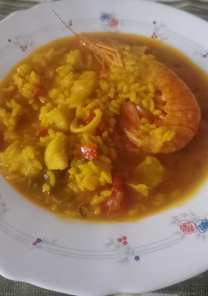 Una foto de Arroz caldoso de pescado y marisco