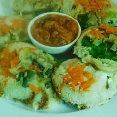 A picture of Tri color Millet Veggie Idlies.